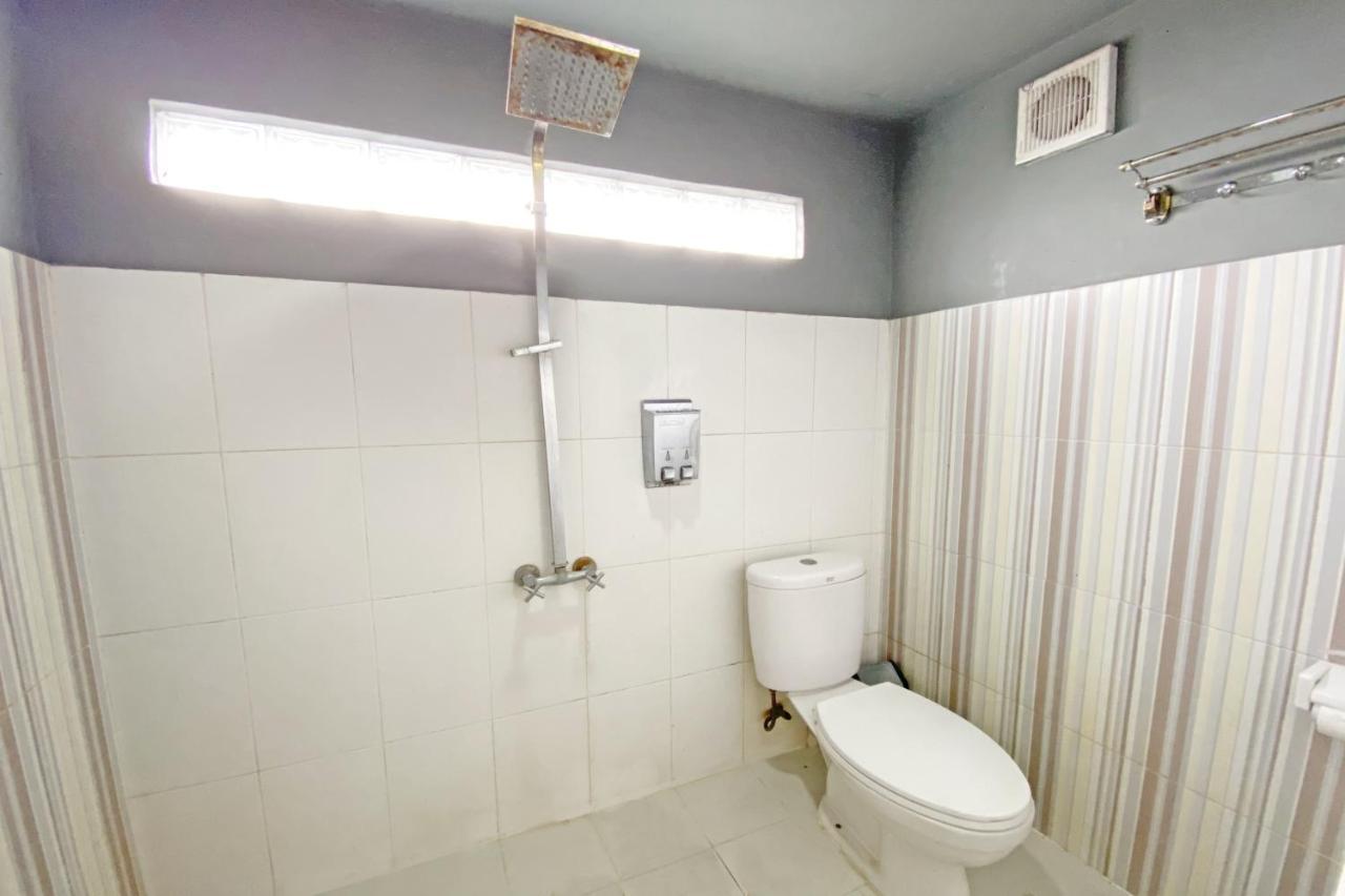 Hotel Ananda Syariah Redpartner Букиттинги Экстерьер фото